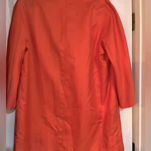 Peach coloured knee length coat size 12